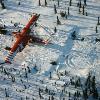 Moving across the tundra ever mindful of damage to the environment.