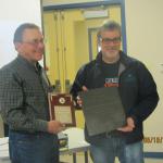 Don Wieben, on behalf of the Town and Municipal District of Fairview, and Mayor Ernest Simms, of St. Anthony exchanging plaques commemorating the Great Canada Aircraft Engine Exchange.