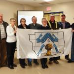 Presenting the Municipal District of Fairview No. 136 flag to Mayor Ernest Simms of St. Anthony.
(L to R) Joe Gans, Jon-Anne Gans, Marg Wieben, Don Wieben, Karen Wilson, Brian Wilson, Norbert Luken and Mayor Ernest Simms.